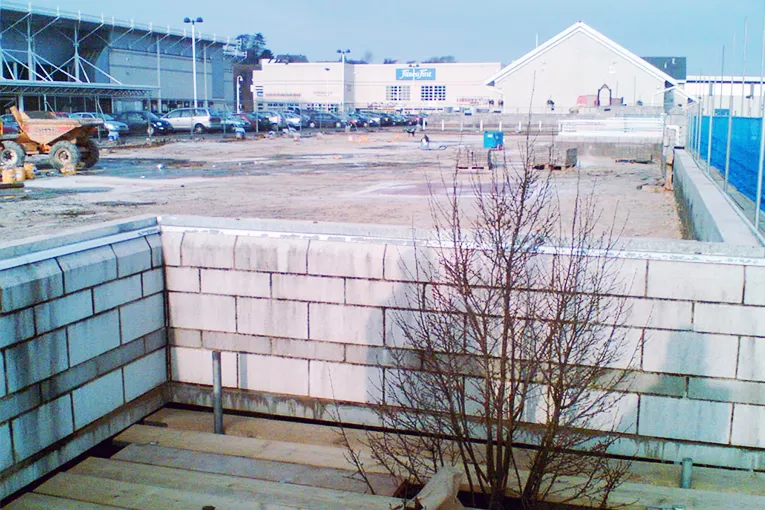 Leca® LWA provided contractors for groundworks at the site of a new international sports village with a lightweight solution for a new road embankment over a former refuse tip subject to settlement.