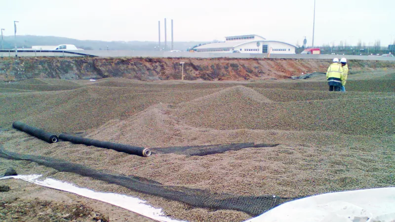 Leca® LWA provided contractors for groundworks at the site of a new international sports village with a lightweight solution for a new road embankment over a former refuse tip subject to settlement.
